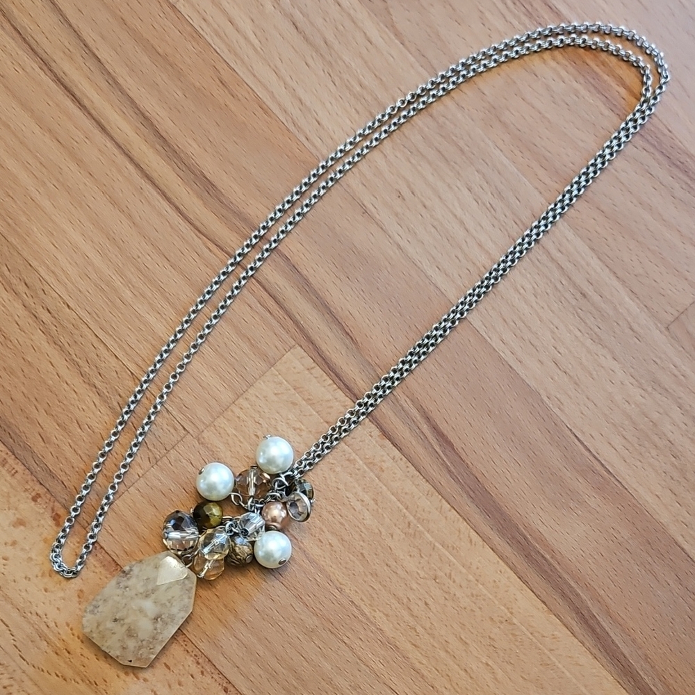 Elegant Silver and Gold Pendant Necklace